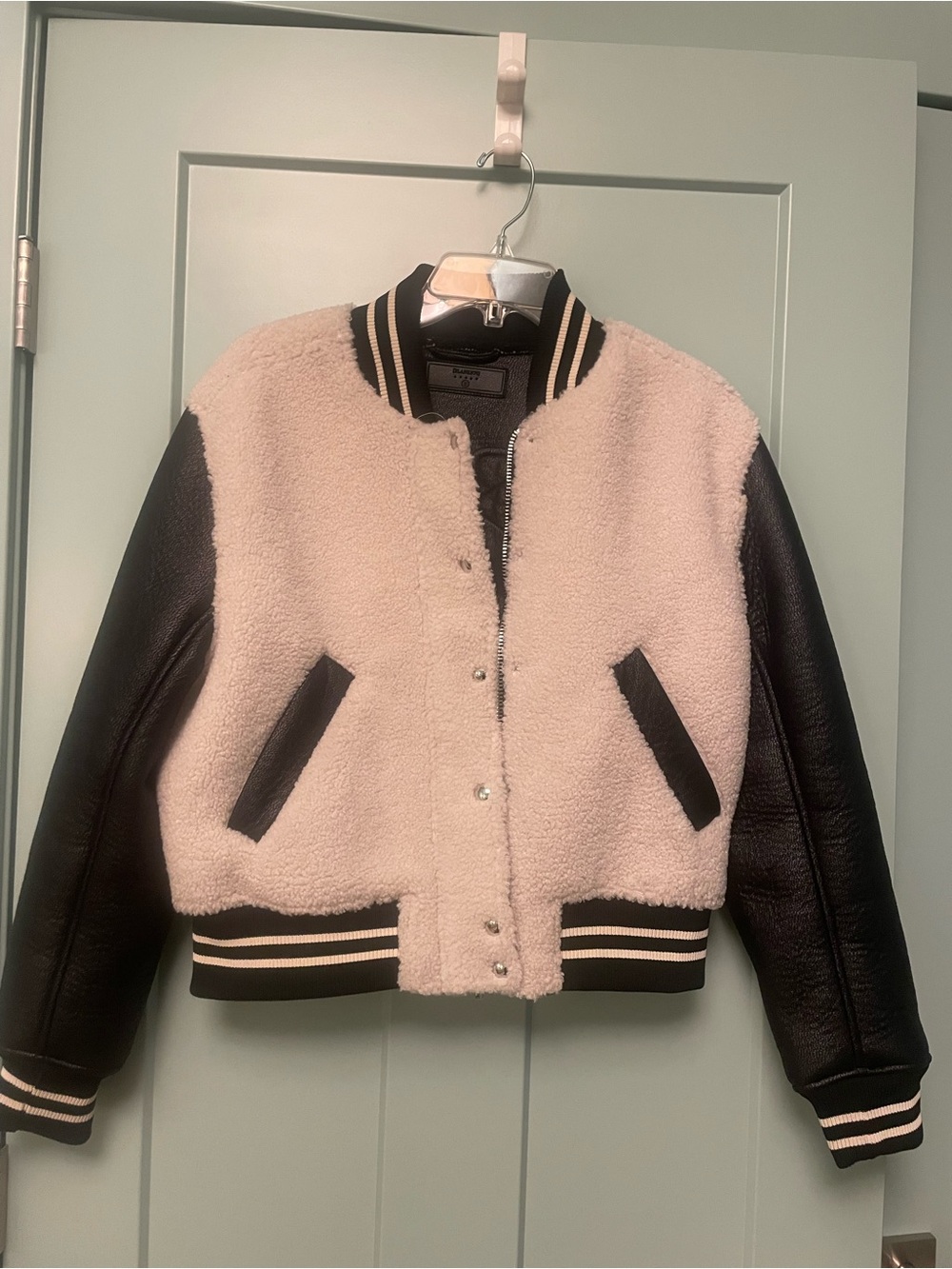 Blank NYC Cream Sherpa Varsity Jacket with Black Sleeves